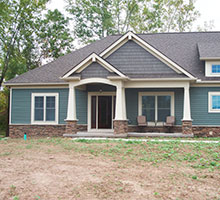 Vinyl siding is maintenance free, but there's still lots of wooden trim that needs attention after a few years in the elements.